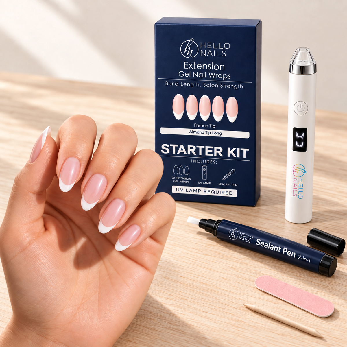 Extension Gel Starter Kit - French Tip hero - hand with almond tip long classic french nails, kit box and contents