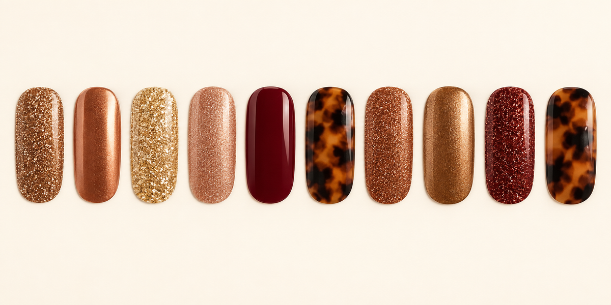 Autumnal nail wraps flat lay in bronze, copper, gold, rose gold, burgundy and tortoise shell