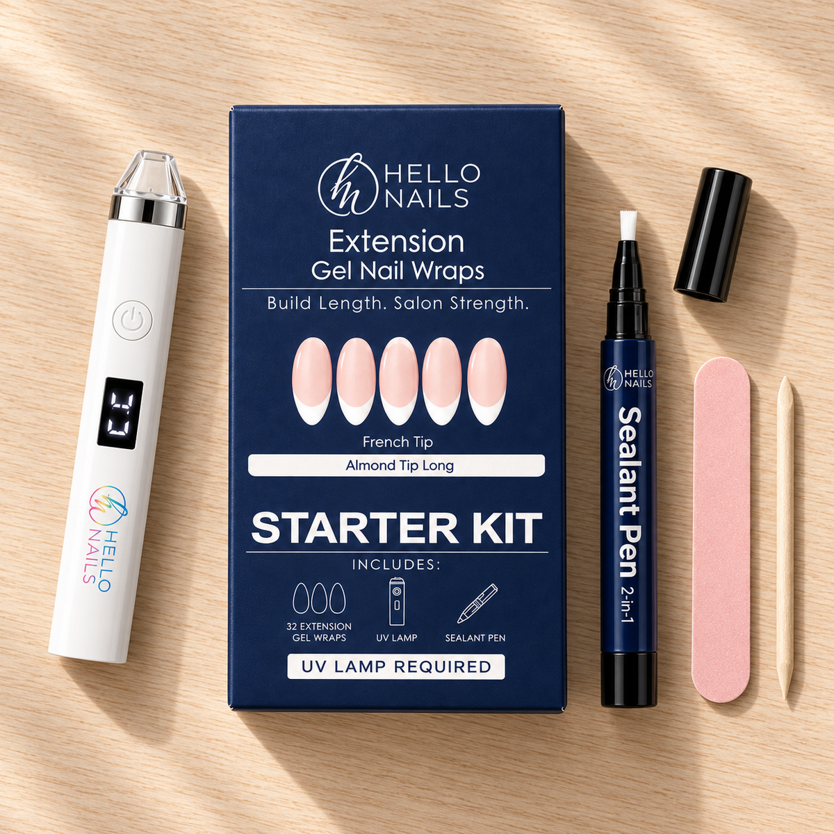 Extension Gel Starter Kit - French Tip flat lay - box, UV lamp, sealant pen, nail file and cuticle stick