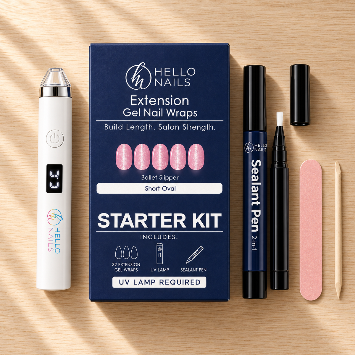 Extension Gel Starter Kit - Ballet Slipper flat lay - box, UV lamp, sealant pen, nail file and cuticle stick